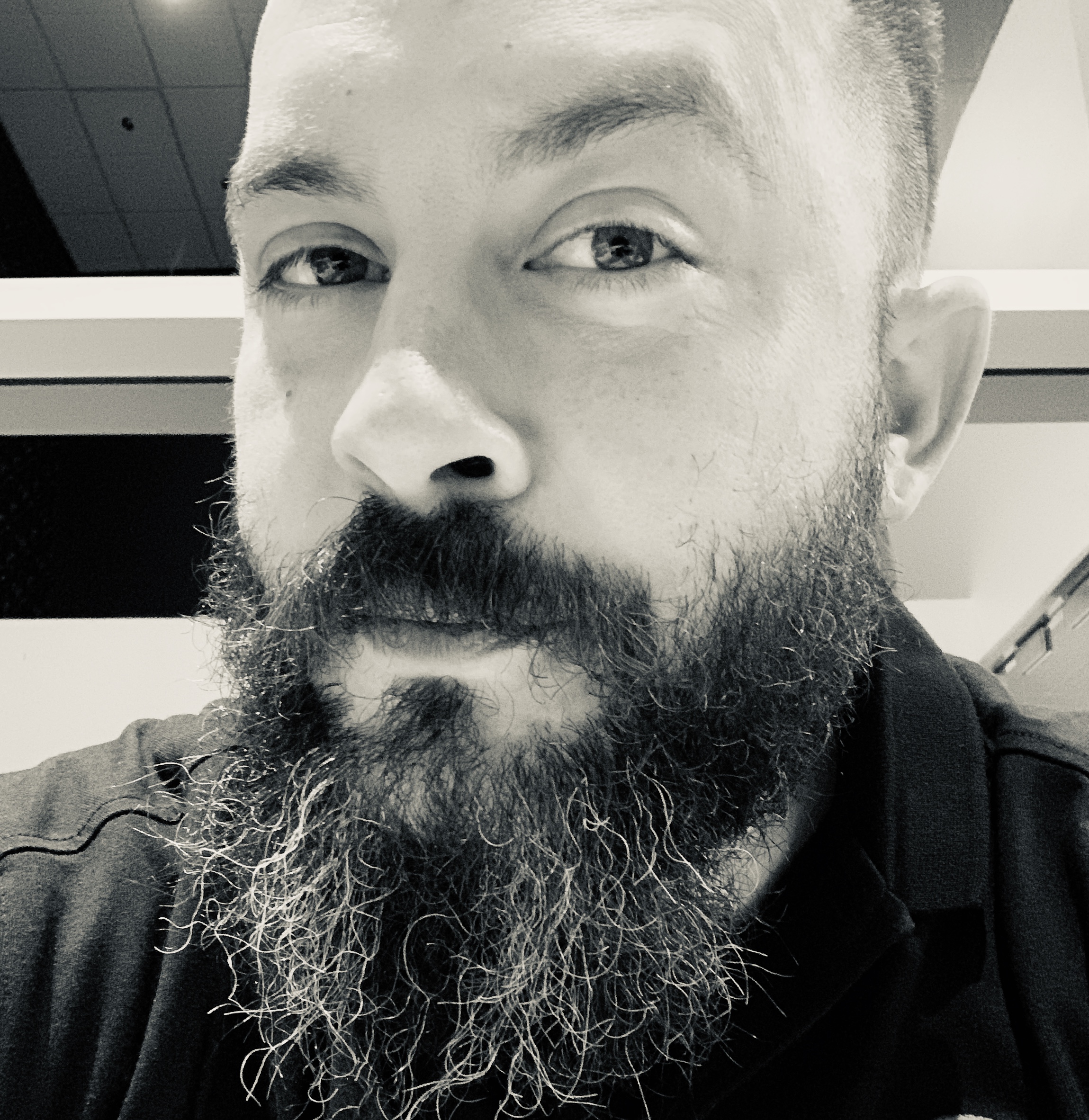 Ray, founder of The Bearded Notary